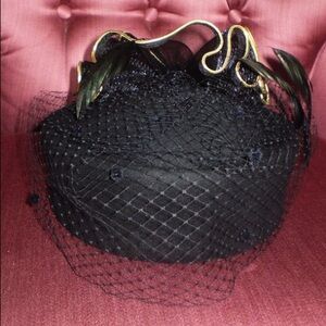 Elegant Black Women's Hat with Gold Accents
